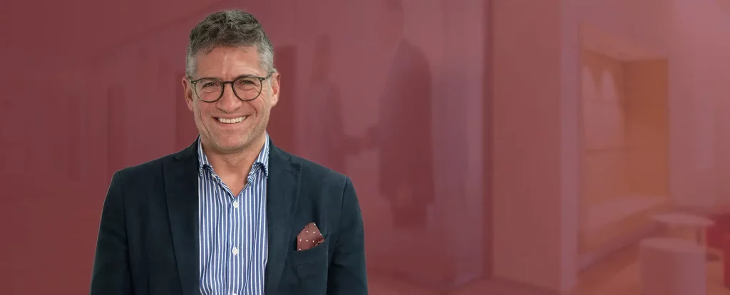 Headshot of Dr. Pascal Scheiwiller smiling